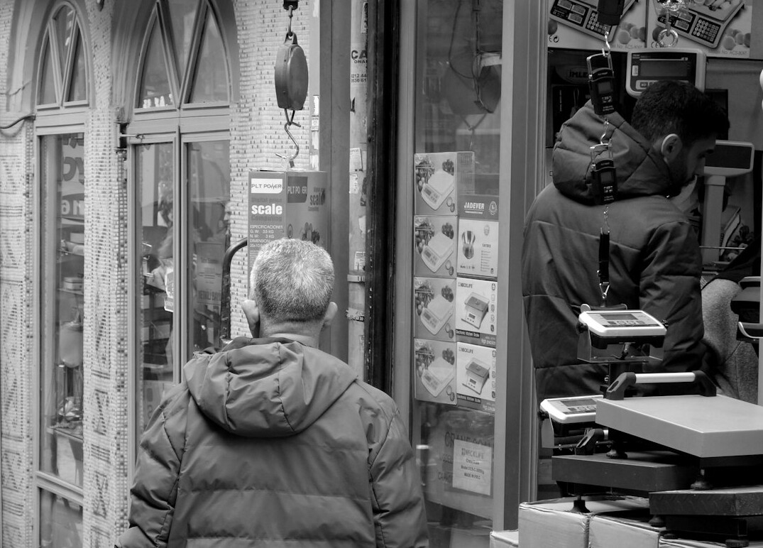 store detective observing customers