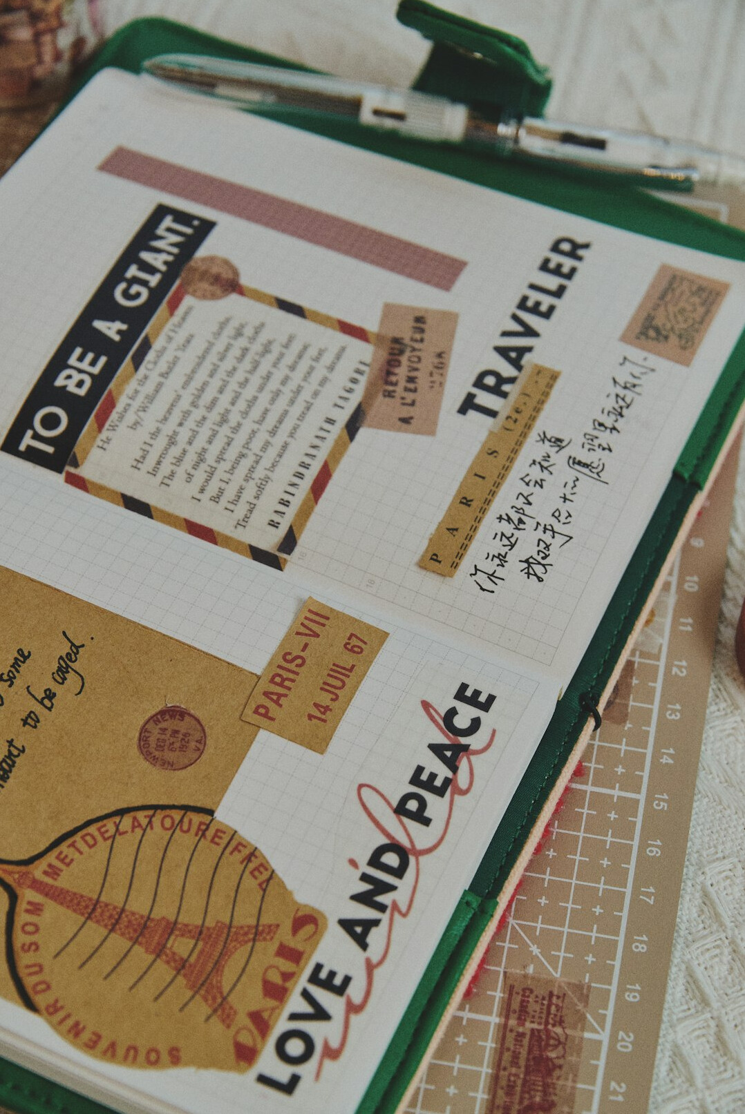 Open notebook with handwritten notes and a pen